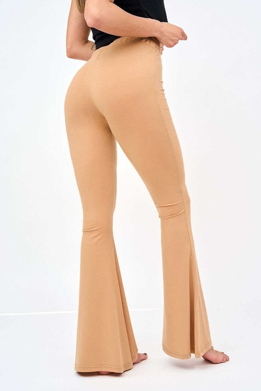 Right Side View of Womens Bell Bottom Leggings in Solid Skin